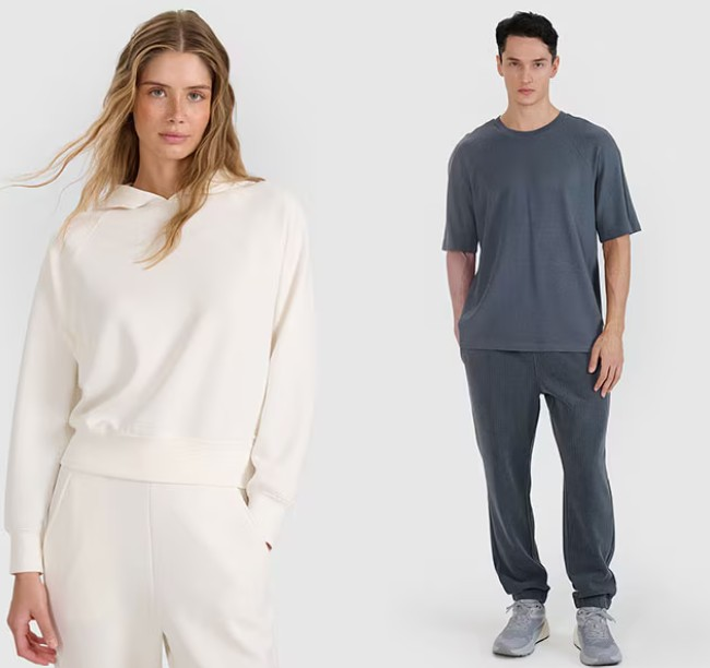 Sieviete ar vīrieti treniņtērpā